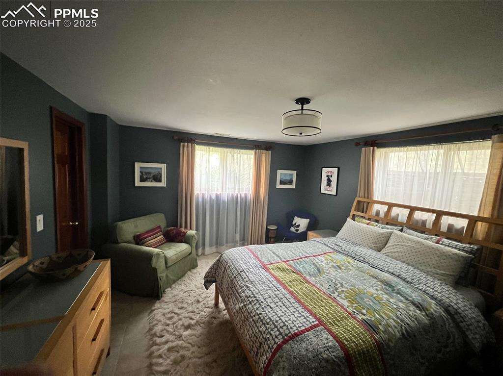 Image 30 of 49: Bedroom featuring carpet flooring