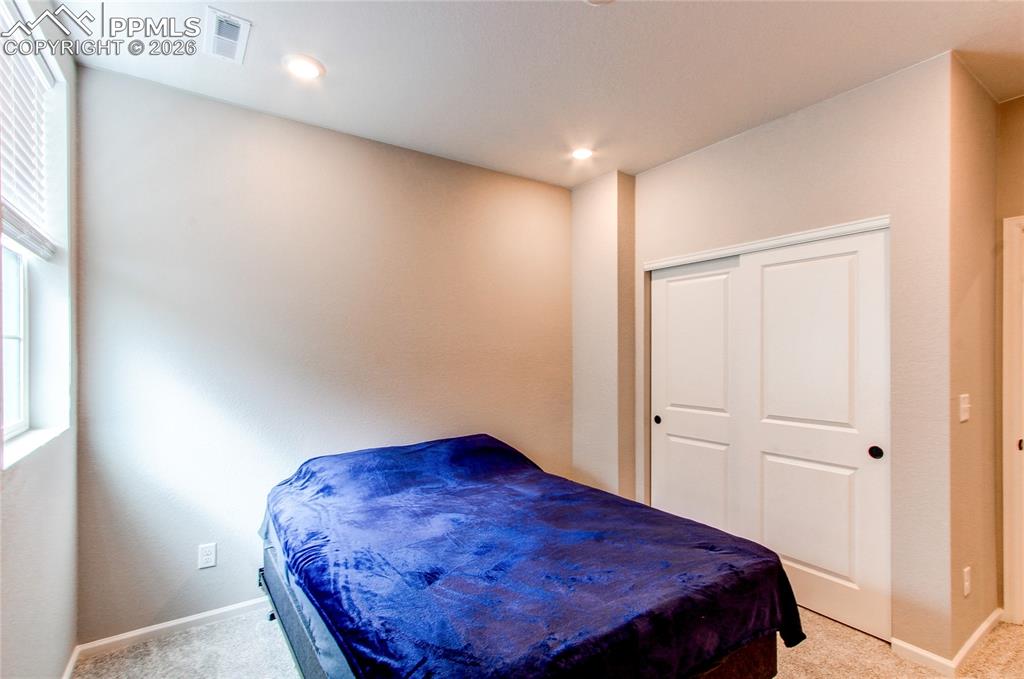 Image 23 of 31: Bedroom