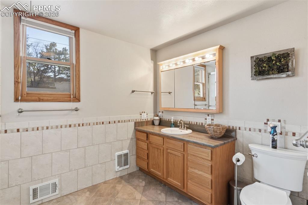 Image 17 of 49: Main level full bathroom