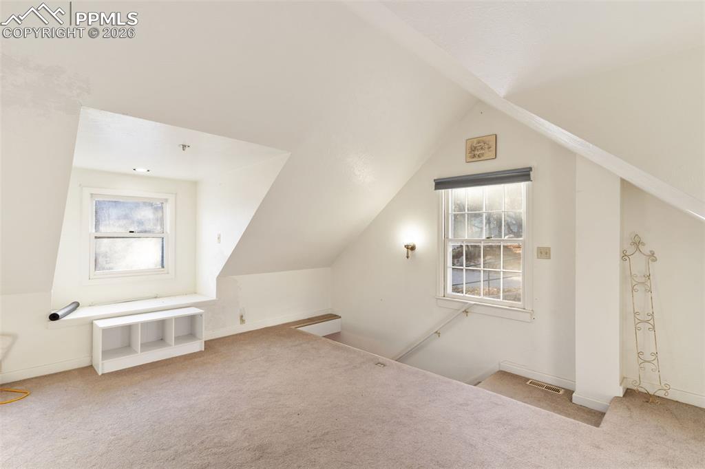 Image 23 of 49: The upstairs/loft area