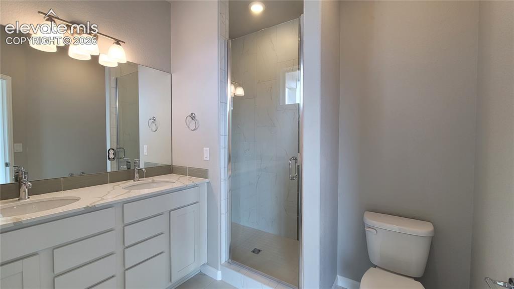 Image 15 of 26: Plush Primary Bathroom!