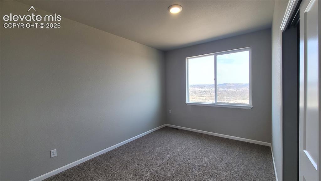 Image 20 of 26: 2nd Bedroom, located on the upper level!