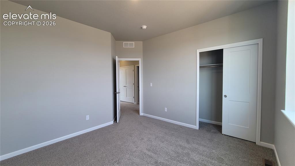 Image 24 of 26: 3rd Bedroom, located on the upper level!