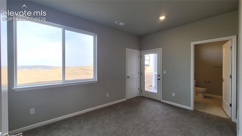 Image 4 of 26: Main Level Junior Suite with 3/4 Bathroom, access to private patio!