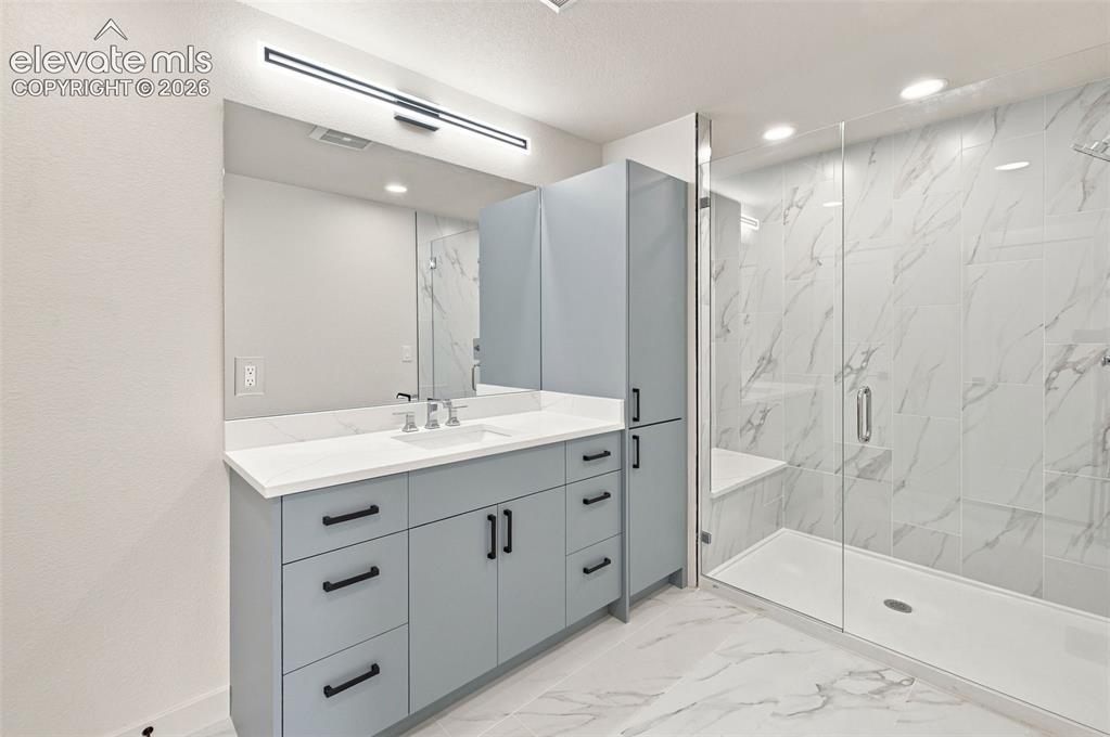 Image 25 of 36: image is from the model unit. subject property has same finishes.