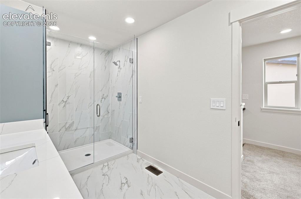 Image 26 of 36: image is from the model unit. subject property has same finishes.