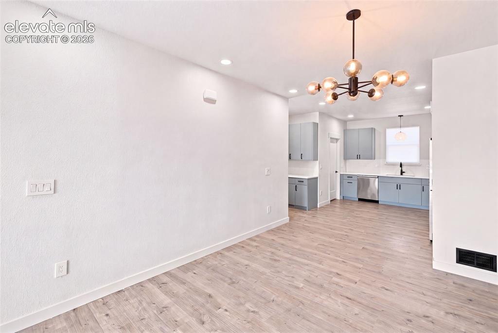 Image 5 of 21: image is from the model unit. subject property has same finishes.