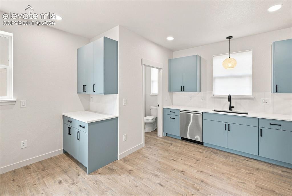Image 5 of 36: image is from the model unit. subject property has same finishes.