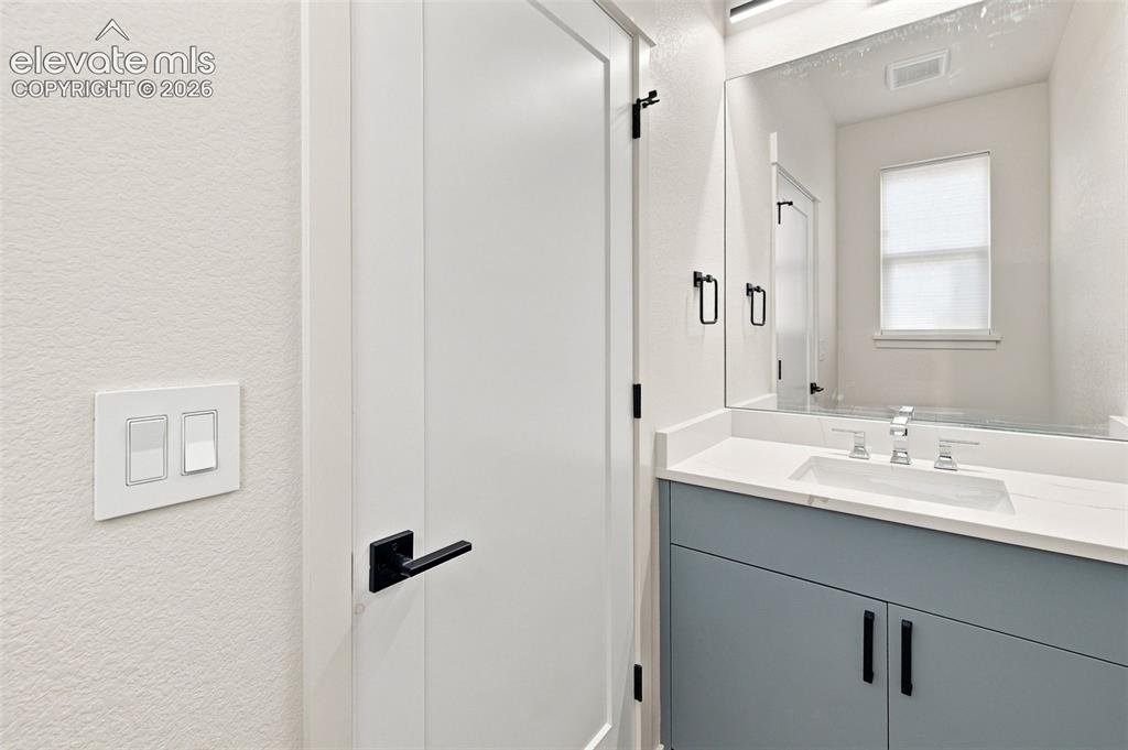 Image 7 of 36: image is from the model unit. subject property has same finishes.