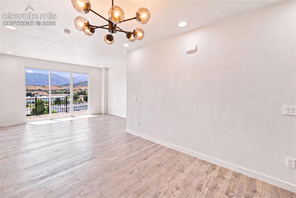 Image 8 of 21: image is from the model unit. subject property has same finishes.
