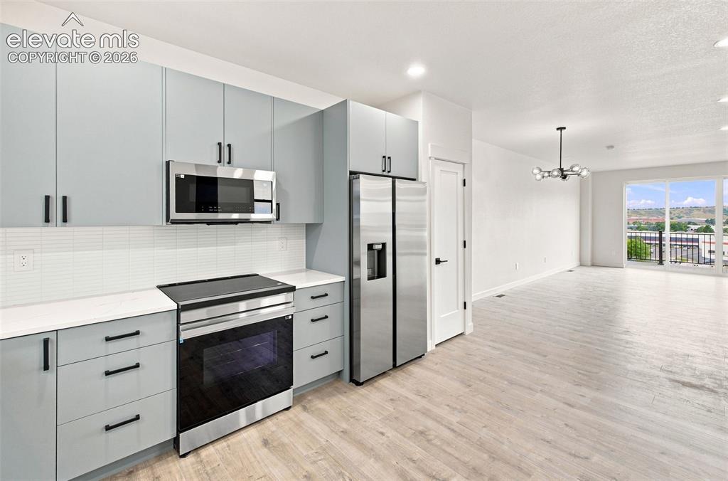 Image 8 of 36: image is from the model unit. subject property has same finishes.