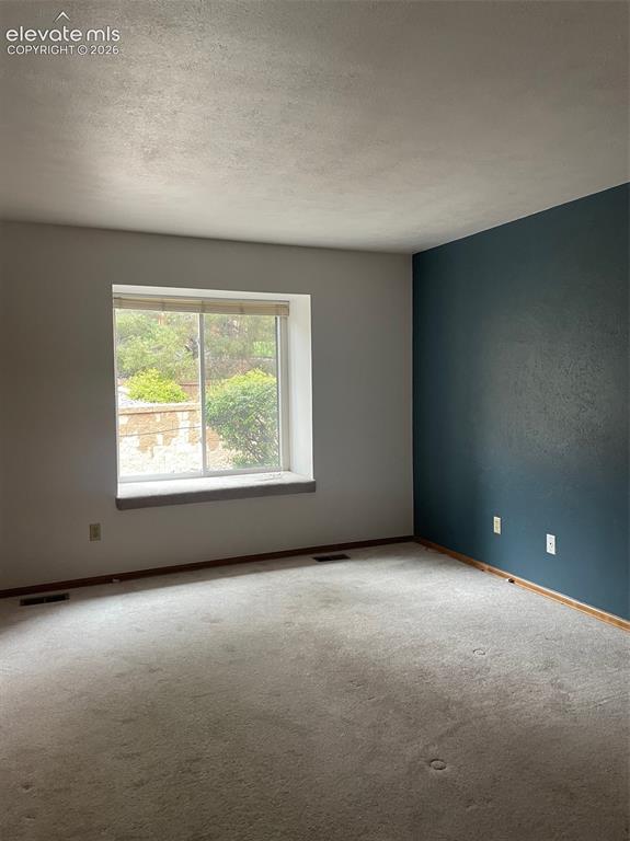 Image 11 of 35: main level beddroom