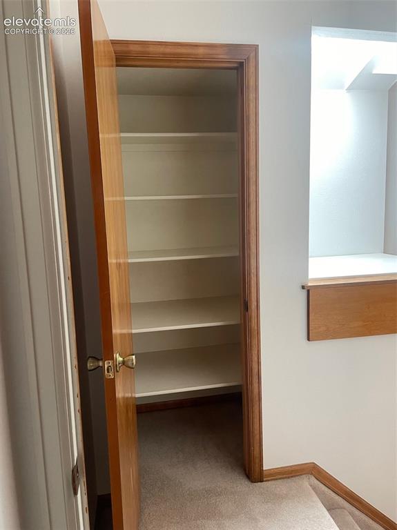 Image 22 of 35: Upper level linen closet.