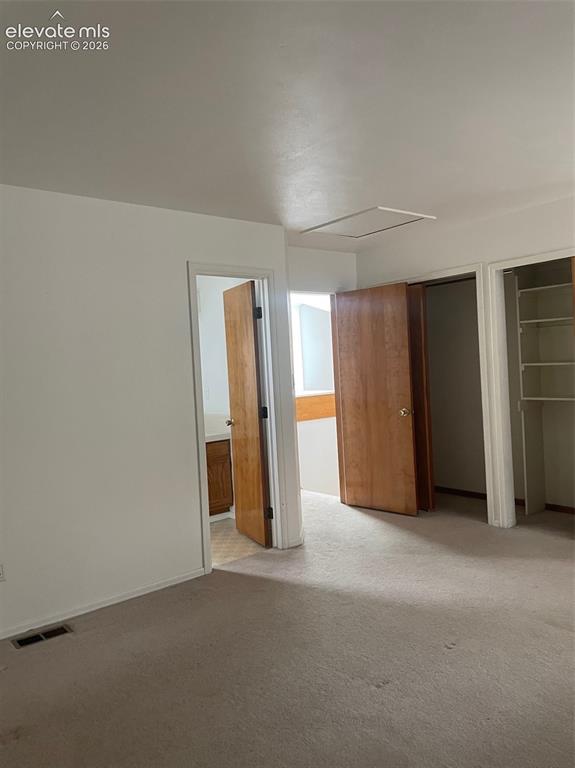 Image 25 of 35: upper level bedroom