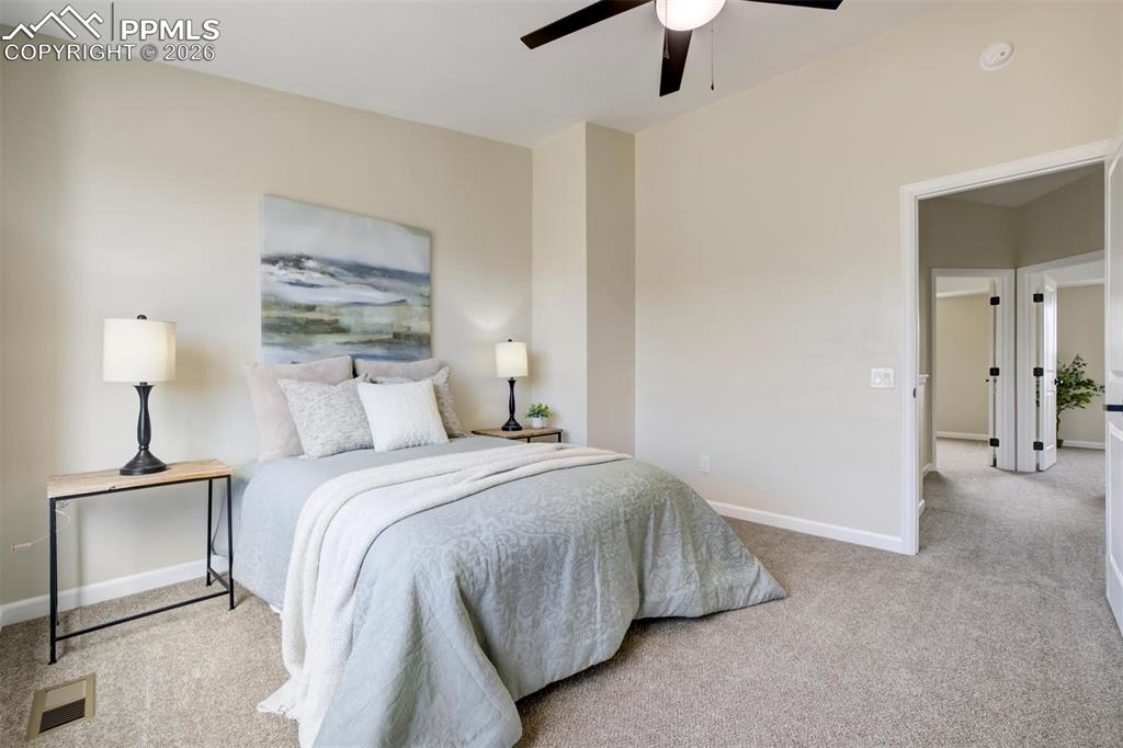 Image 23 of 50: Bedroom