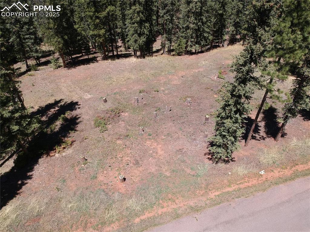 Image 15 of 27: Birds eye view of property with a rural view