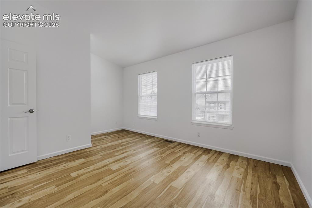 Image 11 of 16: Second bedroom on upper floor