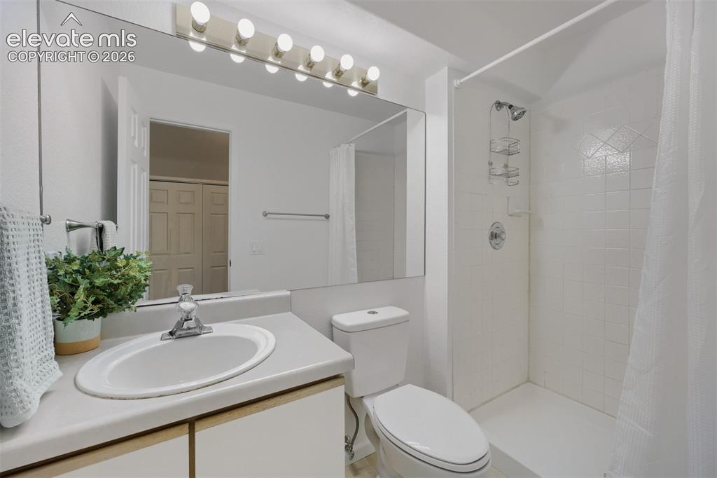 Image 13 of 16: Extra bath in basement
