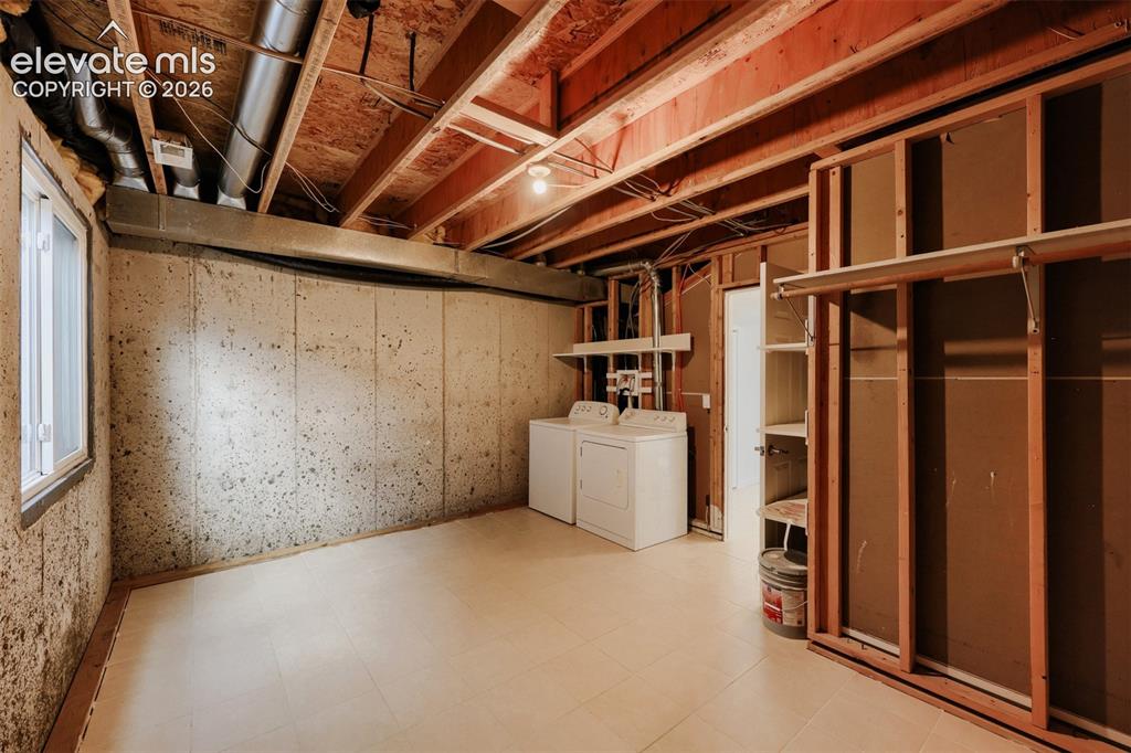 Image 15 of 16: Laundry in basement