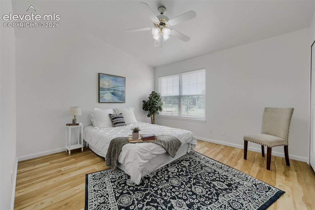 Image 7 of 16: Upper floor bedroom overlooking the park