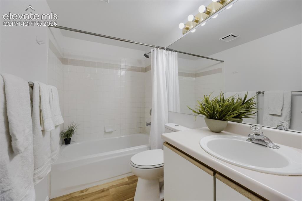 Image 9 of 16: Upper floor bath with tub and shower