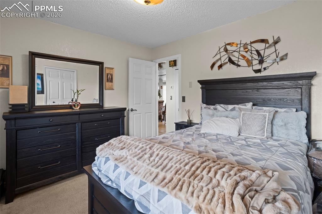 Image 9 of 17: Upper Level Bedroom