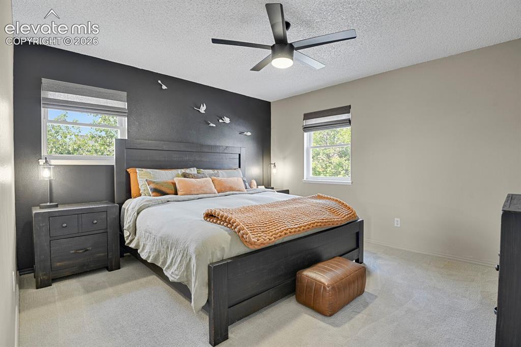 Image 14 of 38: Recessed windows with window treatments