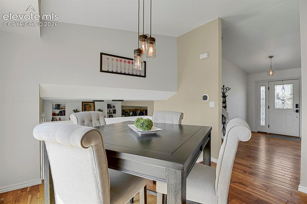 Image 9 of 38: Wood-finish flooring throughout
