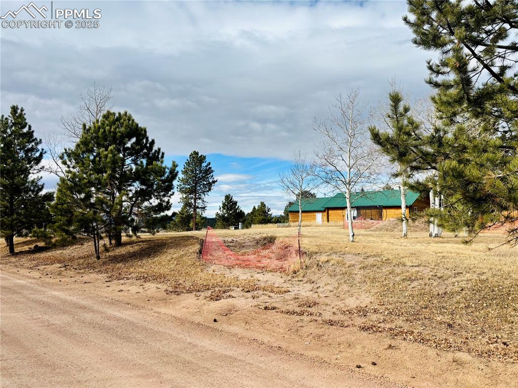 Image 12 of 13: View of yard with a rural view