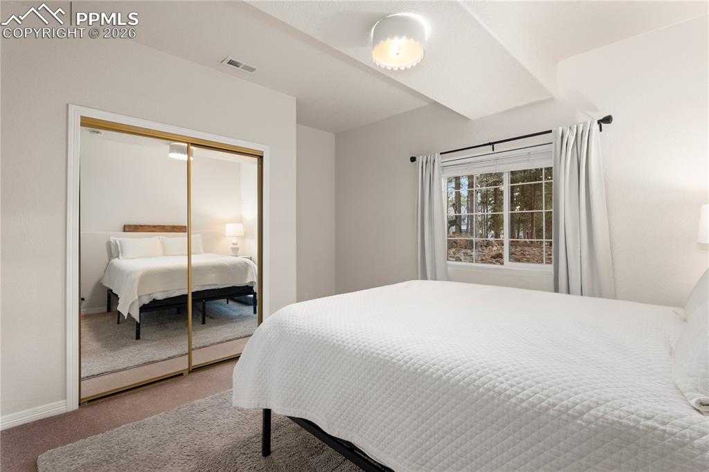 Image 25 of 38: Basement Bedroom