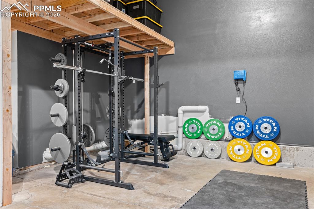 Image 29 of 38: Gym Are in Oversized Garage