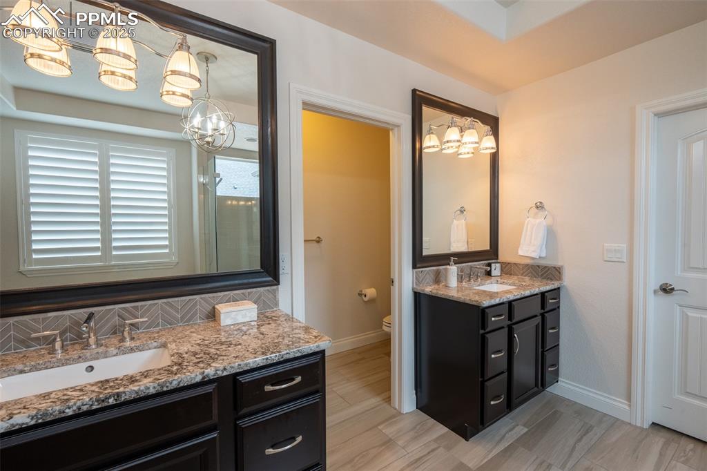 Image 15 of 50: Primary bathroom(1)/closet - main floor