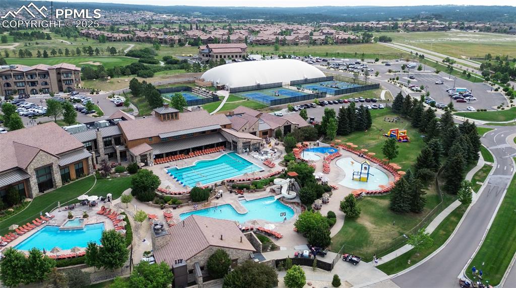 Image 43 of 50: Aerial view of Flying Horse pools and tennis courts
