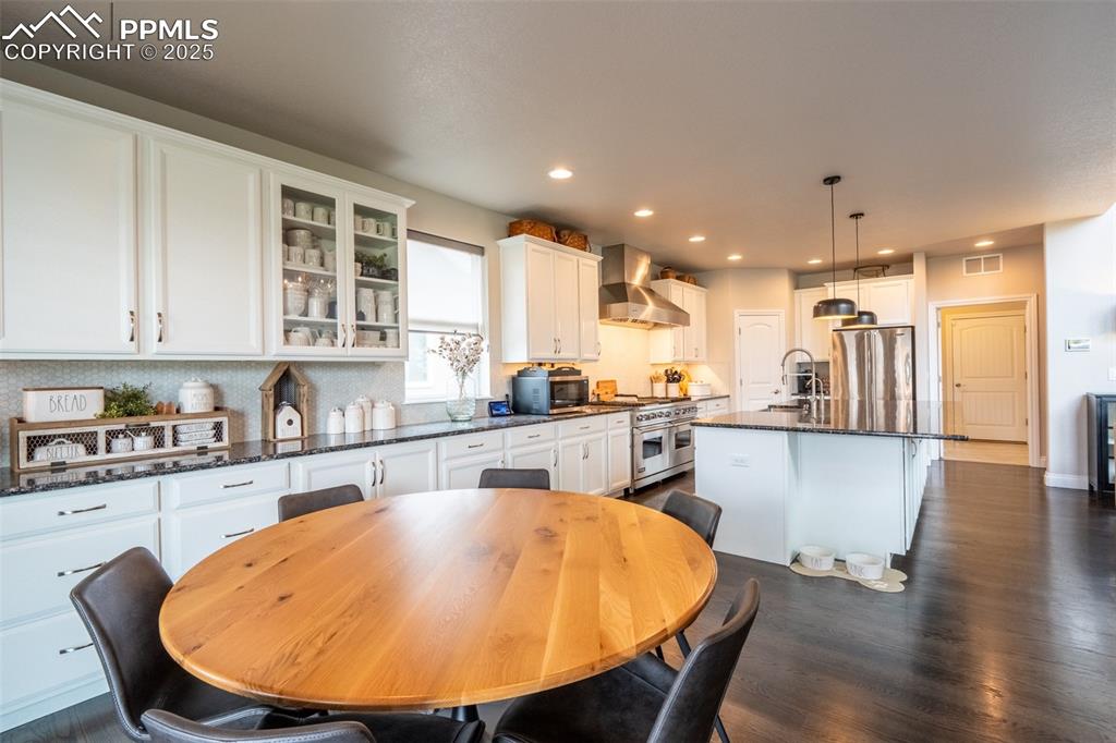 Image 9 of 50: Dining area with walk out - main floor
