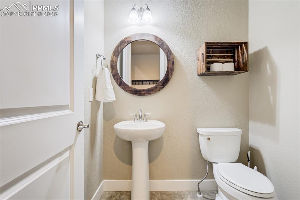 Image 27 of 49: Powder bath on the main level as well. 