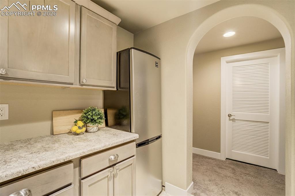 Image 36 of 49: Architectural features like arched entryways add a luxury touch.  