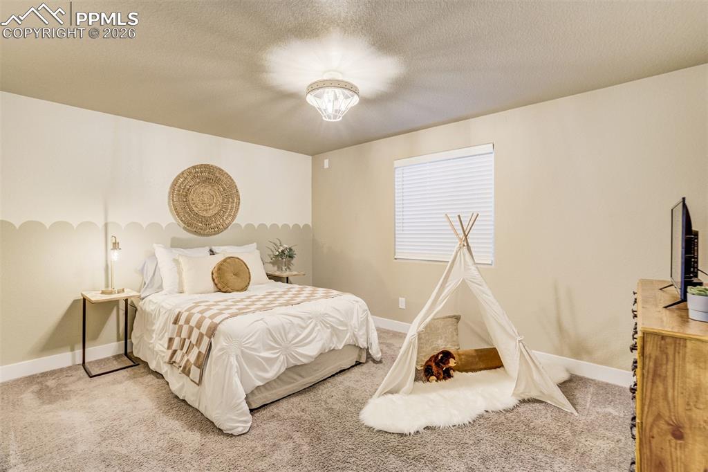Image 39 of 49: Bedroom 4 in the basement. 