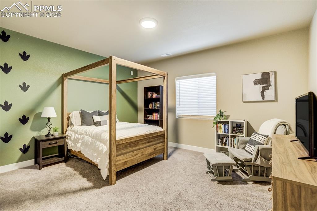 Image 40 of 49: Bedroom 5 in the basement. 