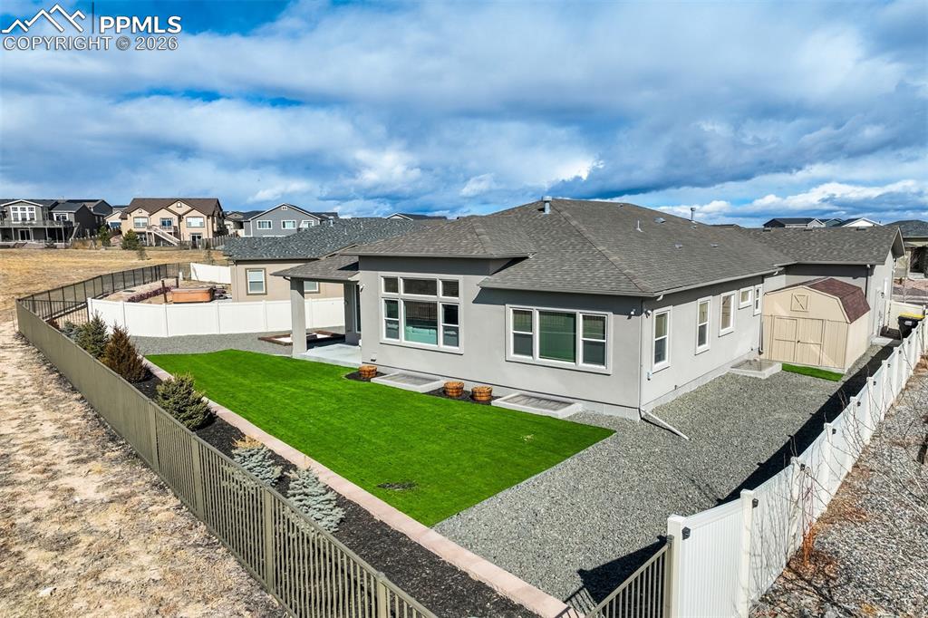 Image 44 of 49: Keeps pets in, keeps chaos out, and gives you the privacy to dance like no 