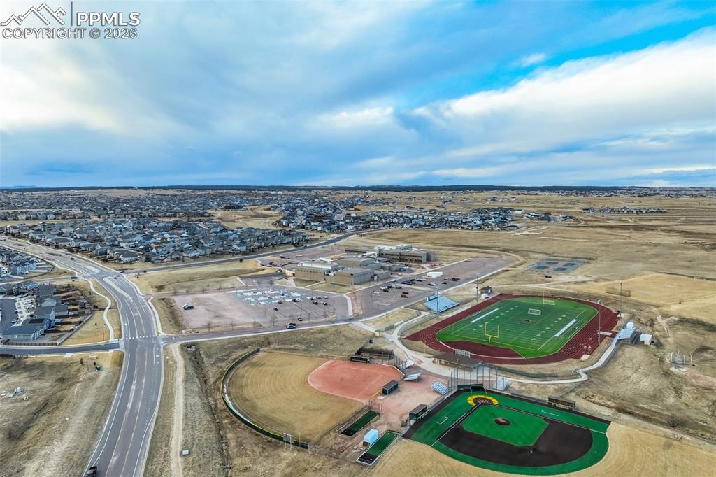 Image 47 of 49: One of the many schools in the community. Large Sports Fieldhouse to open t