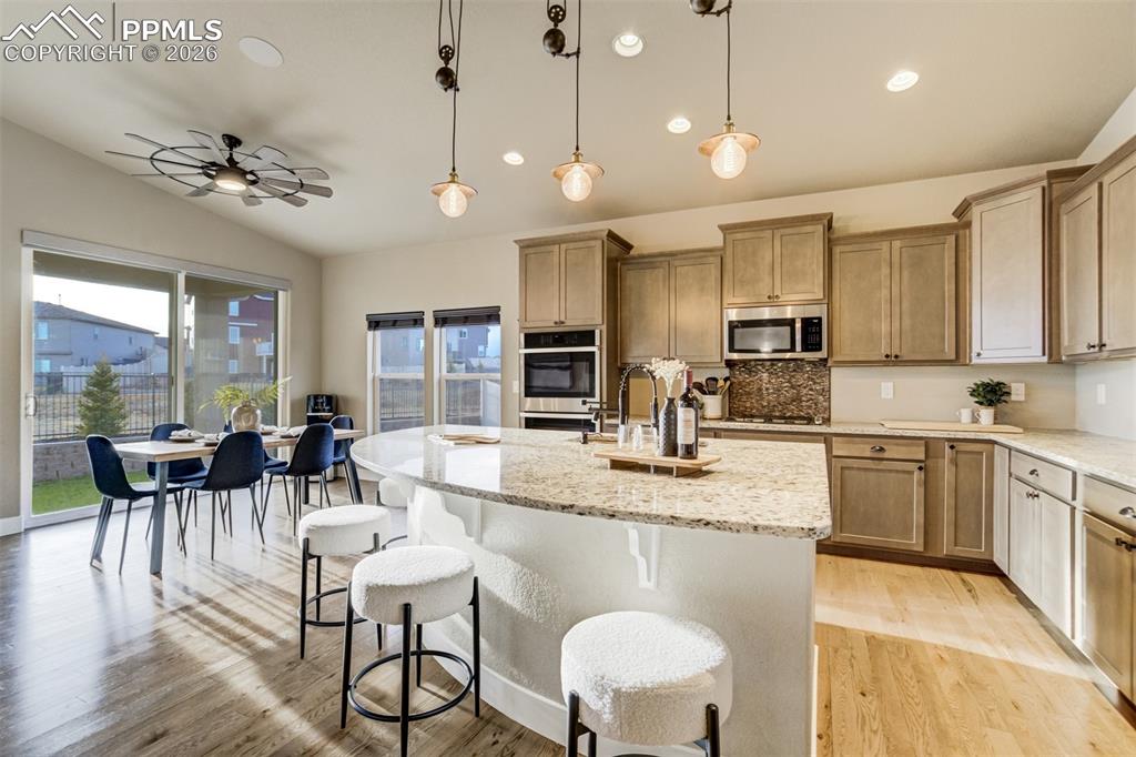 Image 8 of 49: Large enough for three people to cook… and twelve to stand around judging.