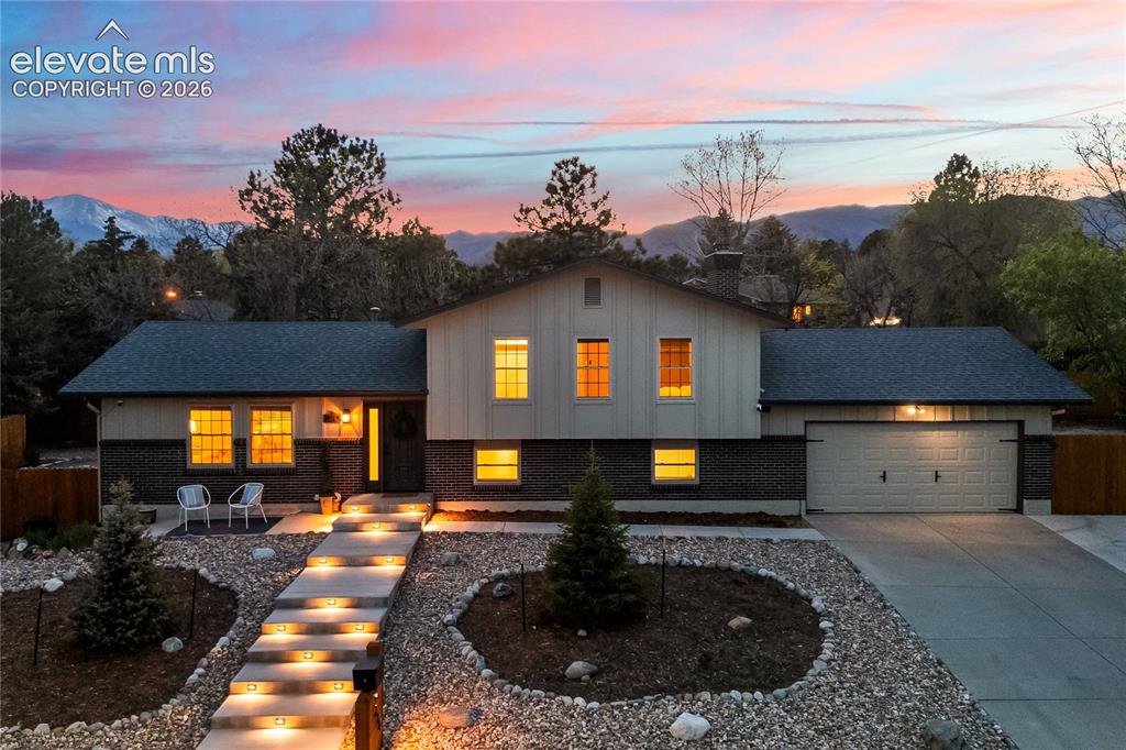 Caption: Twilight over Golden Hills! Welcome your guests with designer five-foot-wide illuminated steps, fram