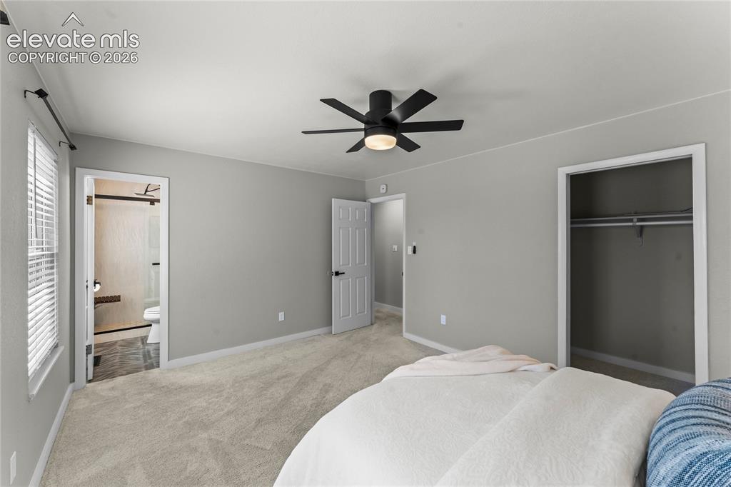 Image 20 of 50: Spacious and quiet, this primary suite offers a neutral palette ready for y
