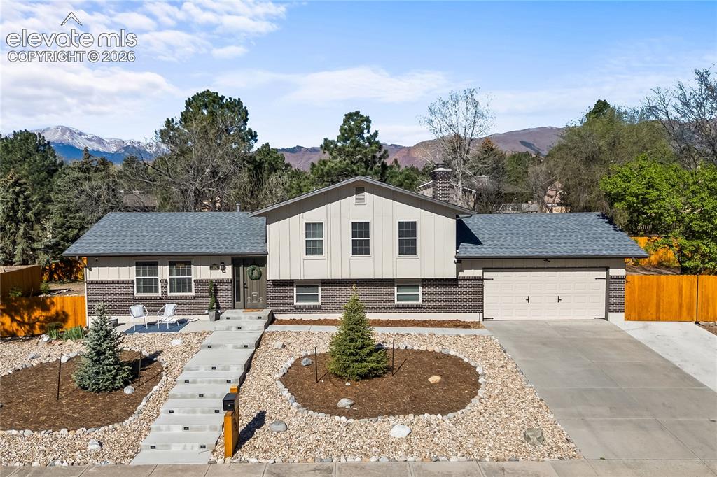 Image 3 of 50: Perched in the most secluded loop of Rockrimmon, this 4-level estate offers
