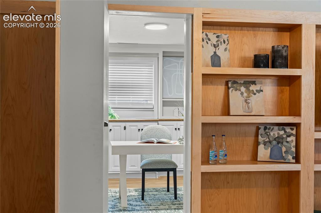 Image 30 of 50: A closer look at the bespoke maple shelving. This hand-crafted woodwork con