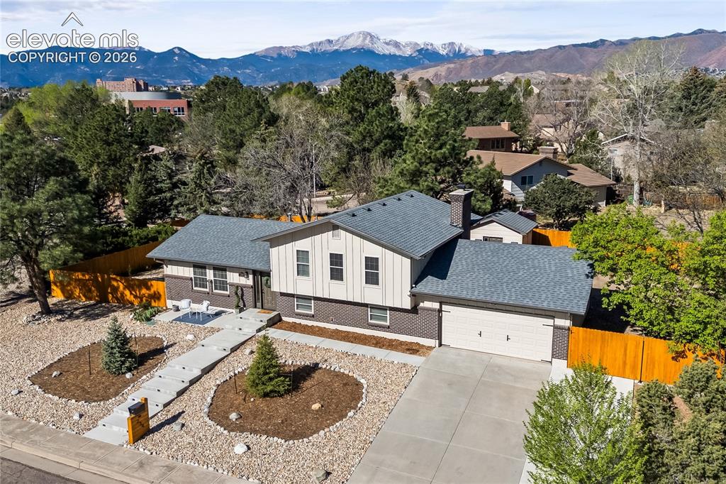 Image 4 of 50: Perched in the most secluded loop of Rockrimmon, this 4-level estate offers