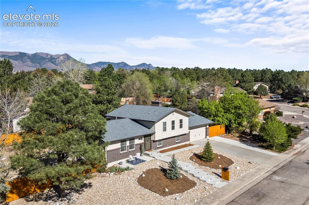 Image 43 of 50: A masterclass in site planning. View the 1,250 sq. ft. lighted patio, the 2