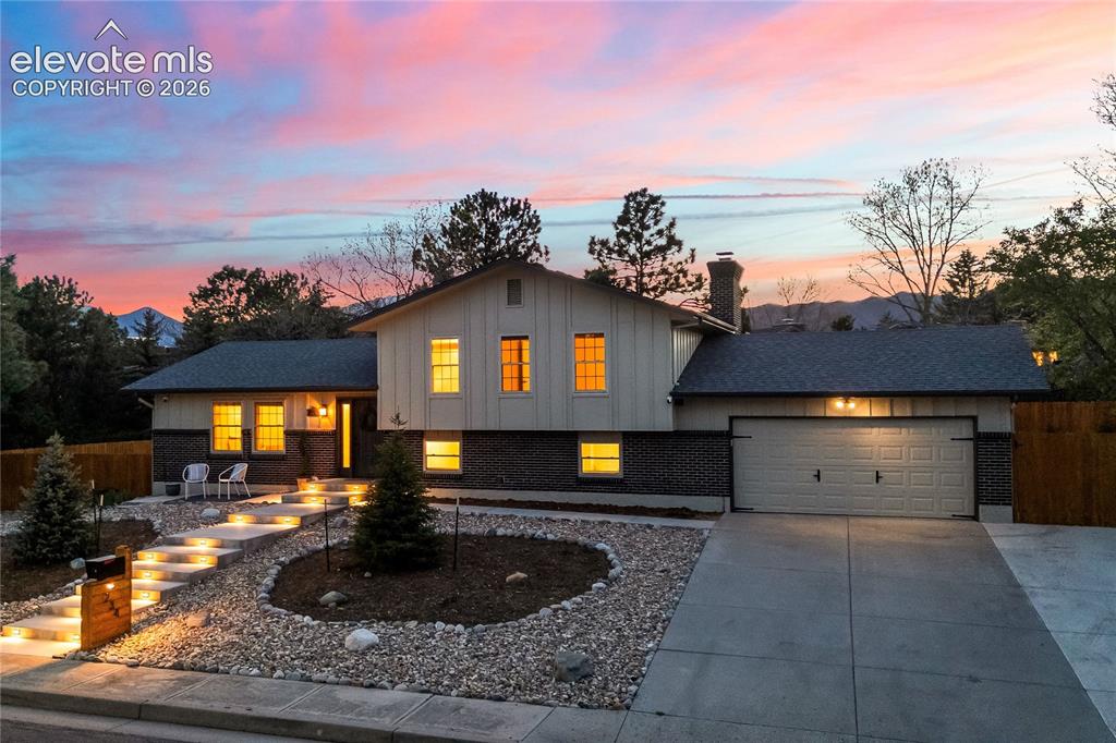 Image 49 of 50: Twilight over Golden Hills! Welcome your guests with designer five-foot-wid