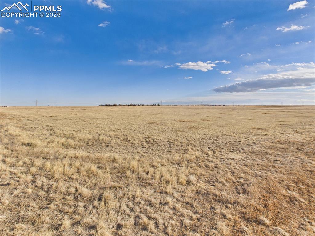 Image 4 of 10: Lot View – Wide Prairie Setting – Clear view across the parcel emphasizing 