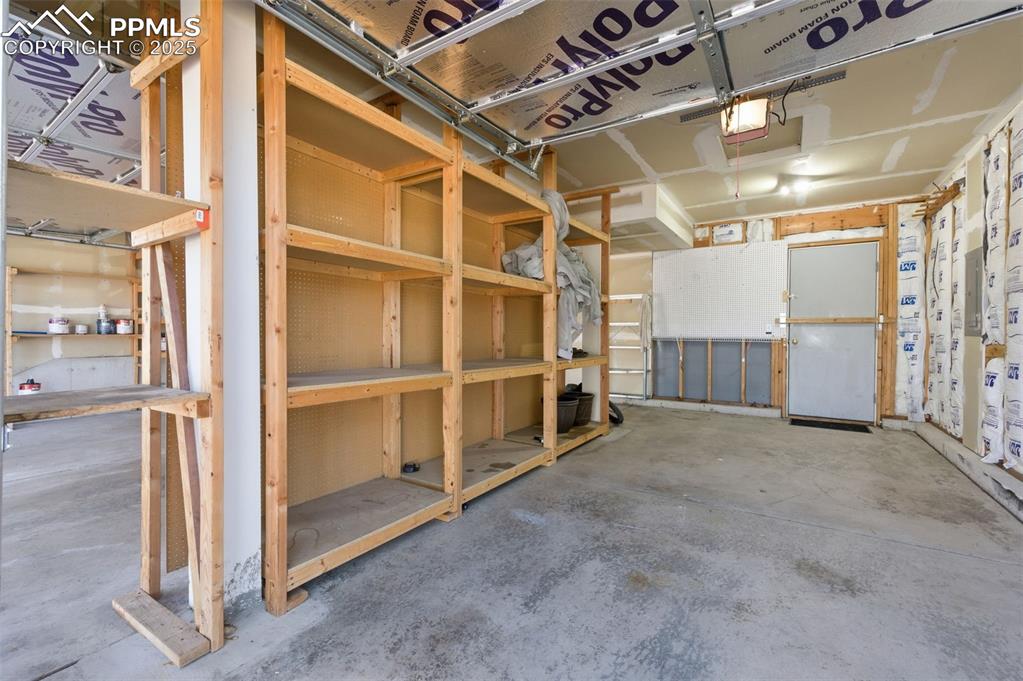 Image 30 of 45: 3-car garage shelving